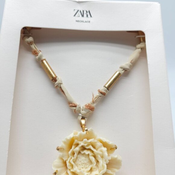 Zara Cream Floral Pendant Necklace With Gold Accents Knotted Fabric Cord - Picture 3 of 5